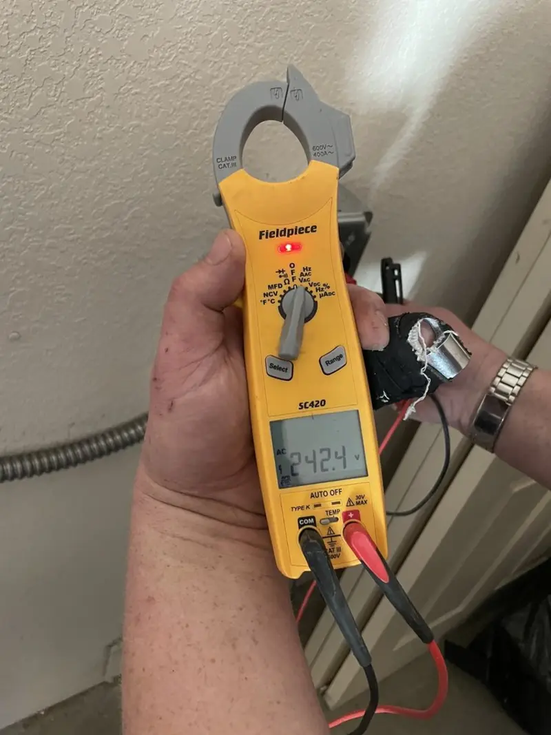 Voltage testing with clamp meter during Generator Installation in Edwardsville